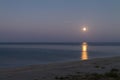 Full moon reflecting in the sea Royalty Free Stock Photo