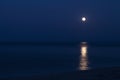 Full moon reflecting in the sea Royalty Free Stock Photo