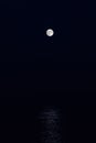 Full moon reflection over the evening sea in Spanish Costa Brava Royalty Free Stock Photo