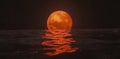 A full moon rests low over a serene, blue ocean, its reflection rippling on the water's surface, forming a Royalty Free Stock Photo
