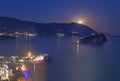 Full moon rise above Budva old city, Saint Nicholas island and Adriatic littoral, night cityscape, Montenegro, Europe. Famous Royalty Free Stock Photo