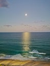 Full Moon rise scene from Pacific Ocean from Surfer Paradise beach in Gold Coast Queensland Australia Royalty Free Stock Photo