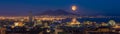 Full moon rises above Mount Vesuvius, Naples and Bay of Naples, Italy Royalty Free Stock Photo
