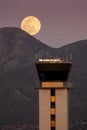 Full Moon Rises Over Air Traffic Control Tower and McDowell Mountain Range