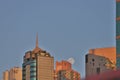 Full Moon setting behind building at hong kong 22 July 2021 F