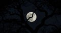 Full moon shining through the branches of a dark tree Royalty Free Stock Photo