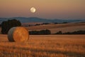 full moon shining over the harvest moon, casting its light on the fields