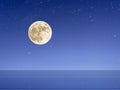 Full moon on starry night at sunset sea , blue  pink cloudy sky sunset light horizon boat skyline nature landscape Royalty Free Stock Photo