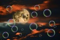 Full moon, sunset sky and bubbles Royalty Free Stock Photo