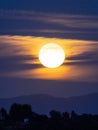 Full moon with thin clouds