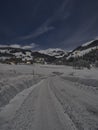 Full moon winter night fairytale, a snow covered road Royalty Free Stock Photo