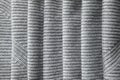 Full page of a loose gray knit fabric texture