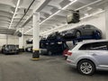 Full parking garage with automatic elevator to lift the car. Hydraulic machine for lifting cars to park in double stacks - New