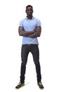 Full portrait of an african man with arms crossed on white background Royalty Free Stock Photo