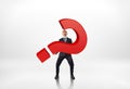 Full portrait of a businessman holding big red 3d question mark isolated on white background Royalty Free Stock Photo