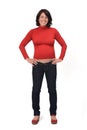 Full portrait of a pregnant woman with casual clothes hands on waist on white background Royalty Free Stock Photo