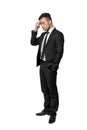 Full portrait of young man in business suit, thinking about something, isolated on a white background Royalty Free Stock Photo