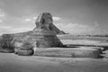 The full profile of the Great Sphinx with the pyramid in the background in Giza. Royalty Free Stock Photo