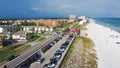 Full public parking along 98 Scenic Gulf Drive and Miramar Beach regional access with sugar white sandy shoreline, gentle blue Royalty Free Stock Photo