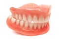 Full removable plastic denture of the jaws. Set of dentures on a white background. Two acrylic dentures. Royalty Free Stock Photo
