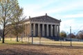 A full-scale replica of the original Parthenon in Athens with tall stone pillars around the building
