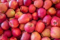 Full screen of red apples background. Many organic fresh apple in market stall, full frame shot. Royalty Free Stock Photo