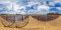 Full seamless hdri spherical panorama 360 degrees angle view on wooden pedestrian bridge of narrow river in sunny day in