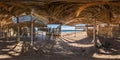 Full seamless spherical hdri panorama 360 degrees angle view abandoned thatched shack or palm tree hut on shores of red sea in Royalty Free Stock Photo