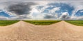 Full seamless spherical hdri panorama 360 degrees angle view on asphalt road among fields in summer day with awesome clouds in