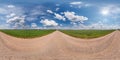 Full seamless spherical hdri panorama 360 degrees angle view on gravel road among fields in summer day with awesome clouds before Royalty Free Stock Photo