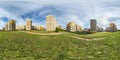 Full seamless spherical hdri panorama 360 degrees angle view light in windows of multistory building area of urban development