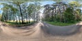 Full seamless spherical hdri panorama 360 degrees angle view on no traffic asphalt road among tree alley in summer day in