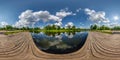 Full seamless spherical hdri panorama 360 degrees angle view on wooden pier of lake or river in morning or sunset with beautiful