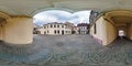 full seamless spherical hdri 360 panorama near old houses in narrow courtyard or backyard with tunnel to main street in Royalty Free Stock Photo