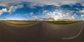 full seamless spherical hdri 360 panorama view on no traffic asphault road among fields with evening sky and clouds in Royalty Free Stock Photo