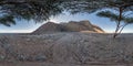 Full seamless spherical hdri 360 panorama view of sunset in desert under tree with sun shines from behind the mountain on coast of Royalty Free Stock Photo