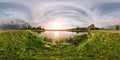 Full seamless spherical panorama 360 by 180 angle view on the shore of lake in evening before storm in equirectangular projection Royalty Free Stock Photo