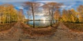 Full seamless spherical panorama 360 degrees angle view golden autumn near the shore of wide lake in sunny day. 360 panorama in Royalty Free Stock Photo