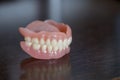 Full set of Medical denture on table