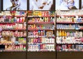 Full shelves of varied baby cosmetics in a chain supermarket in Riga