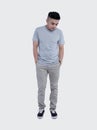 Full shoot handsome man was posing wearing heather grey t-shirt short sleeve with mockup concept Royalty Free Stock Photo