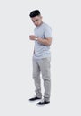 full shoot handsome man was posing wearing heather grey t-shirt short sleeve with mockup concept Royalty Free Stock Photo