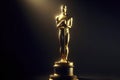 full size gold oscar statue isolated on solid black background. ai generative