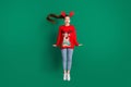 Full size photo of attractive funny cute lady jump high x-mas party good mood wear reindeer headwear horns red ugly