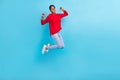 Full size photo of beautiful appearance boy girl jumping point fingers herself isolated on blue color background Royalty Free Stock Photo