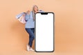 Full size photo of charming grey hair lady lean on product placard banner go shopping isolated on beige color background