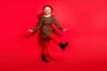 Full size photo of cheerful aged woman happy positive smile have fun dance party isolated over red color background Royalty Free Stock Photo