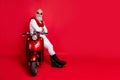 Full size photo of confident retired man with his arms crossed sit on bike wearing white pullover pants trousers boots Royalty Free Stock Photo