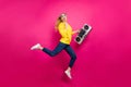 Full size photo of cool lady jumping high funky rocker dj wear casual outfit isolated pink background Royalty Free Stock Photo