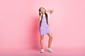 Full size photo of crazy little kid listen wireless headset music sing wear violet overall isolated on pastel color